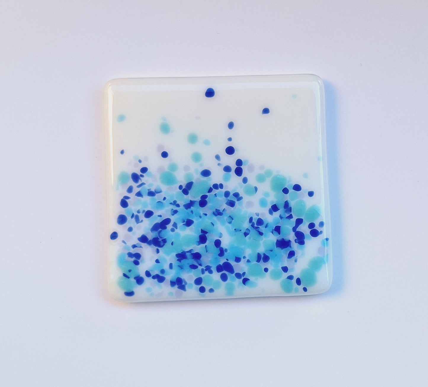 Coasters in White with Blue Tones