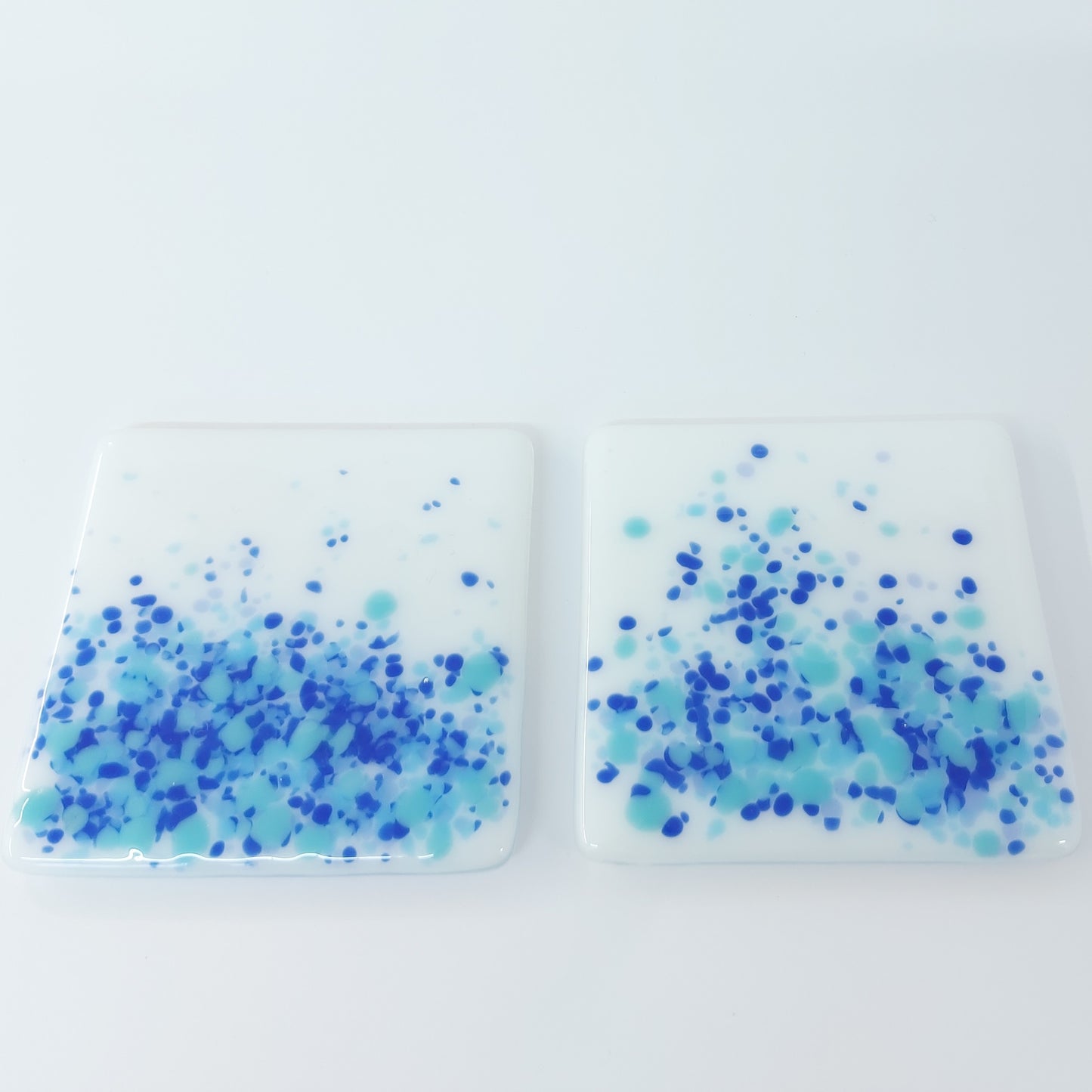Coasters in White with Blue Tones