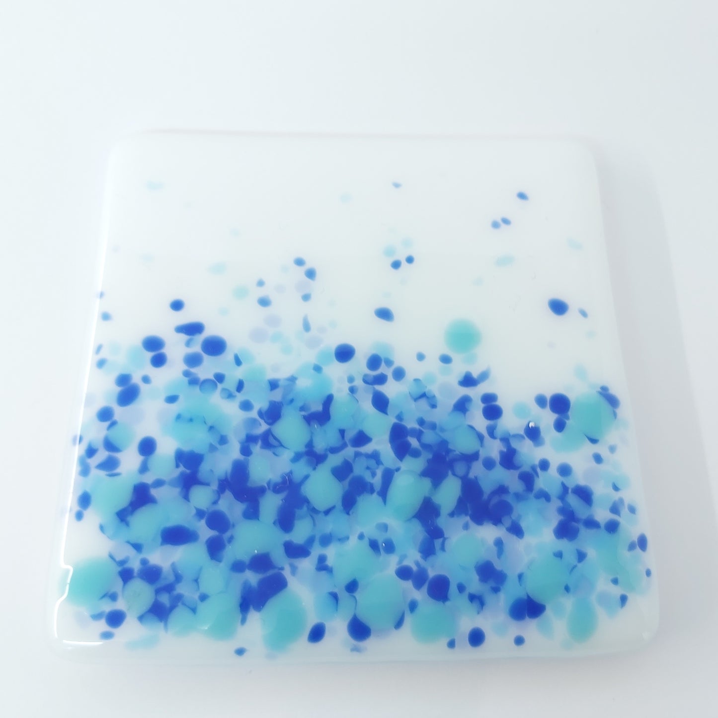 Coasters in White with Blue Tones
