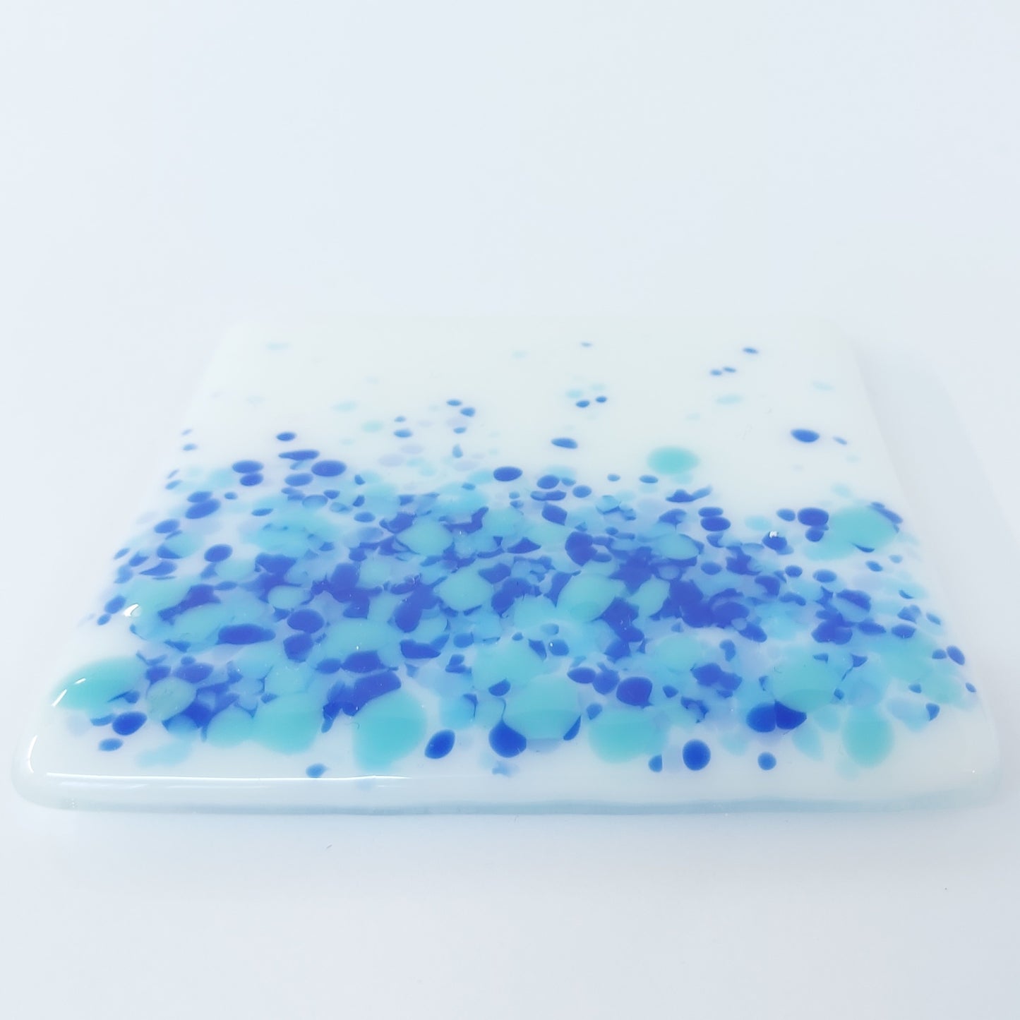 Coasters in White with Blue Tones