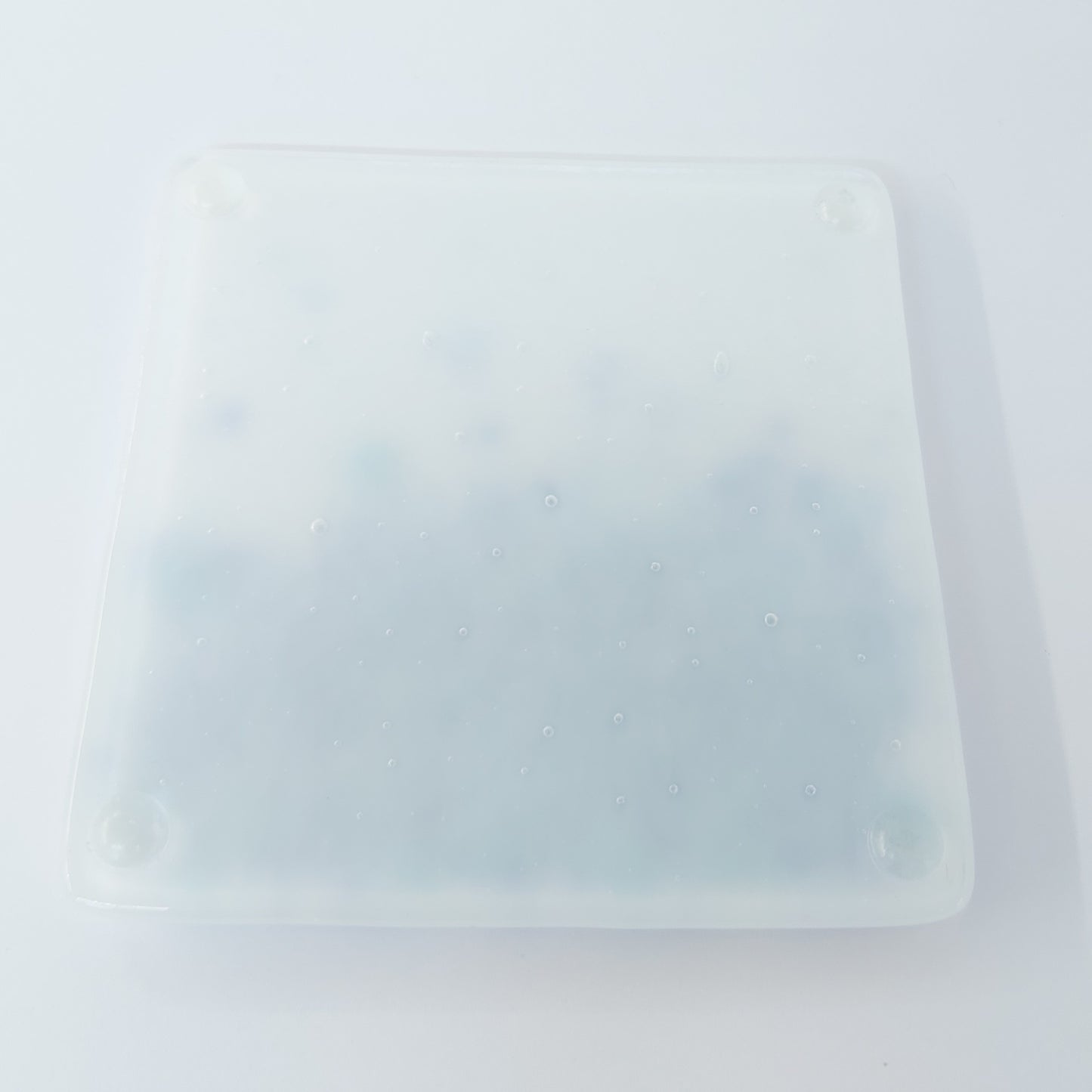 Coasters in White with Blue Tones