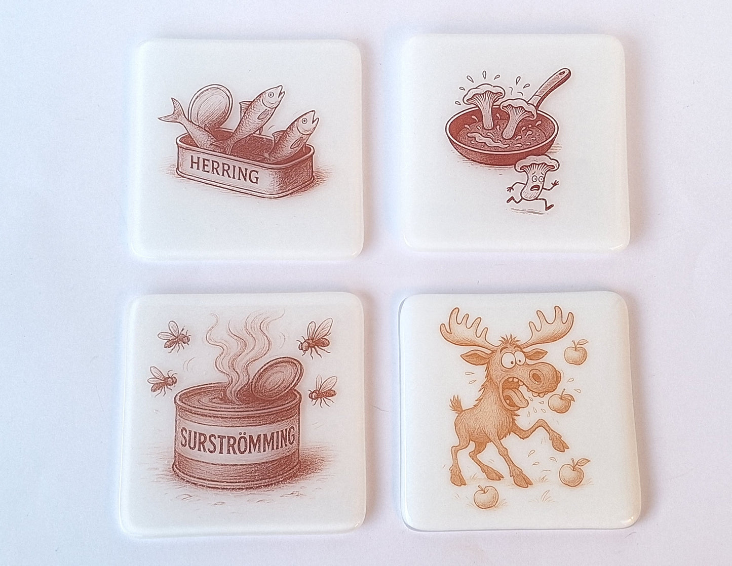 Set med 4 handgjorda glasunderlägg i fusingglas